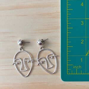 Silver Face Outline Earrings